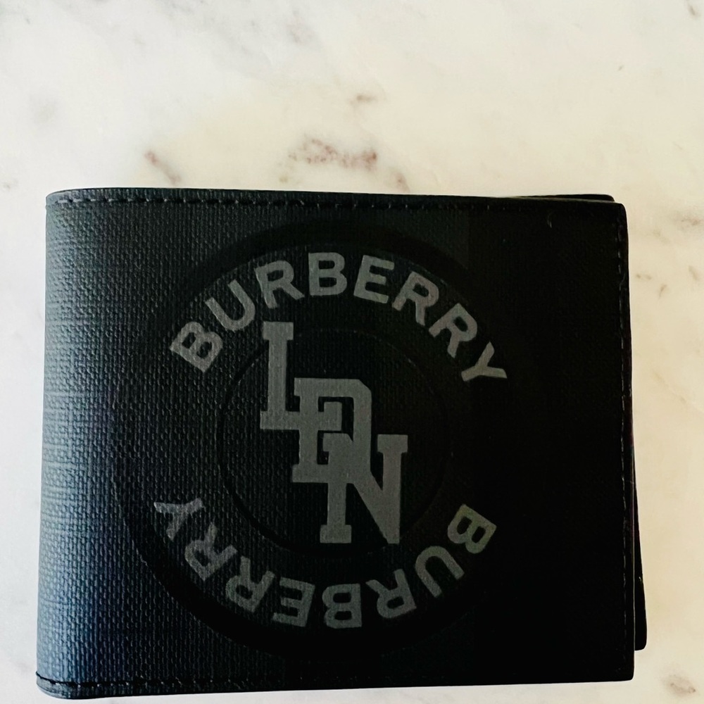 Burberry LDN wallet. 
 black color with print. 
 size 11x9 cm approximately
